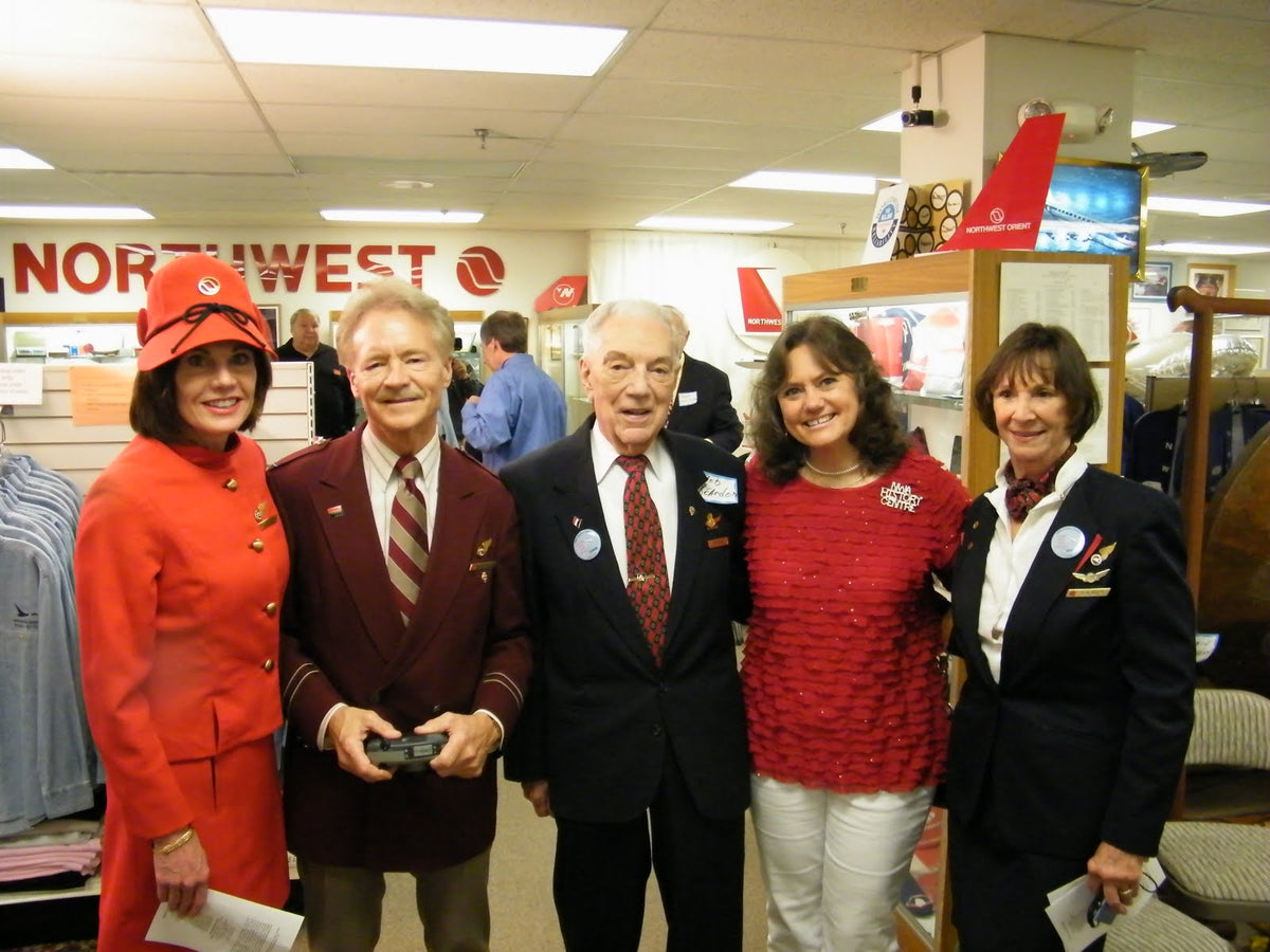 Some of our founding volunteers model vintage Northwest uniforms from different eras.